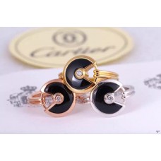 Пръстен Amulette de Cartier с черен оникс и диамант в жълто злато, бяло злато и розово злато