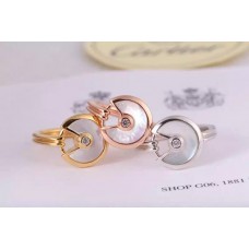 Пръстен Amulette de Cartier с бял седеф и диамант в жълто злато, бяло и розово злато